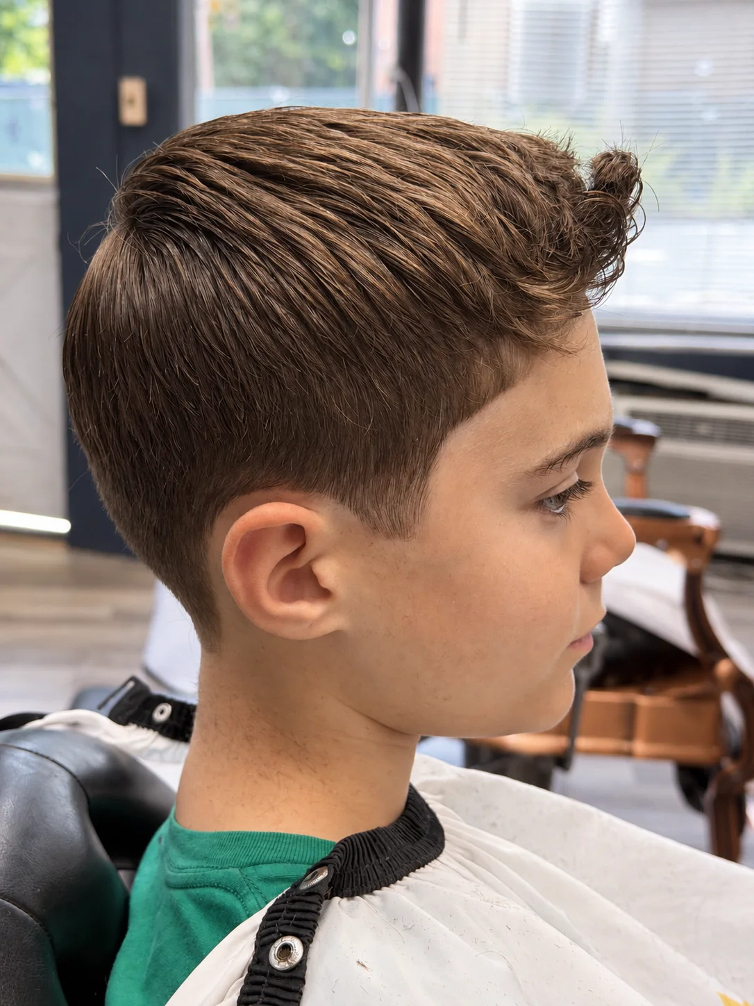 Finished side-part haircut at JR Barbershop