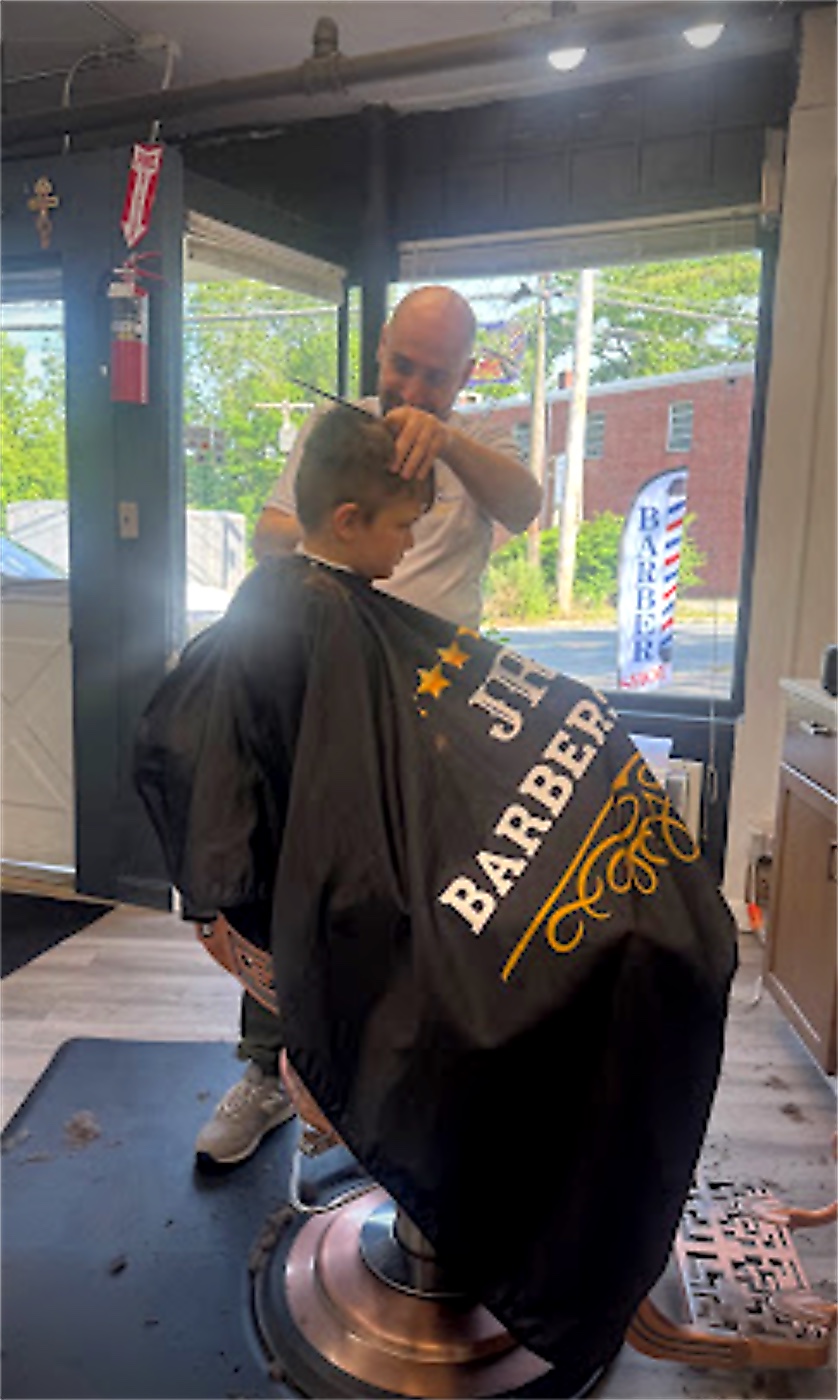 Service in the barber chair at JR Barbershop